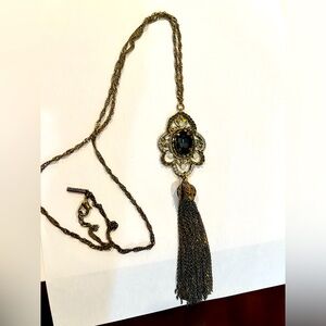 Antique design brown long neck with crystals and precious stones